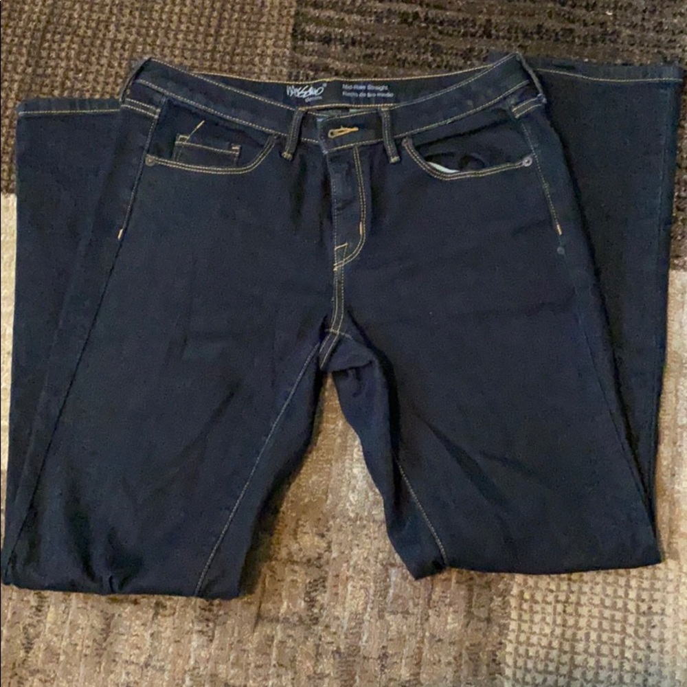 Blue mid-rise, straight leg jeans. Never worn!